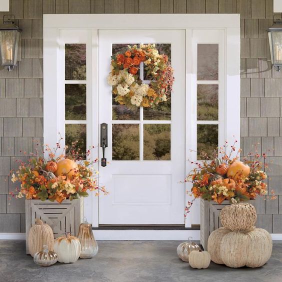 Faux fall flowers on a front porch
